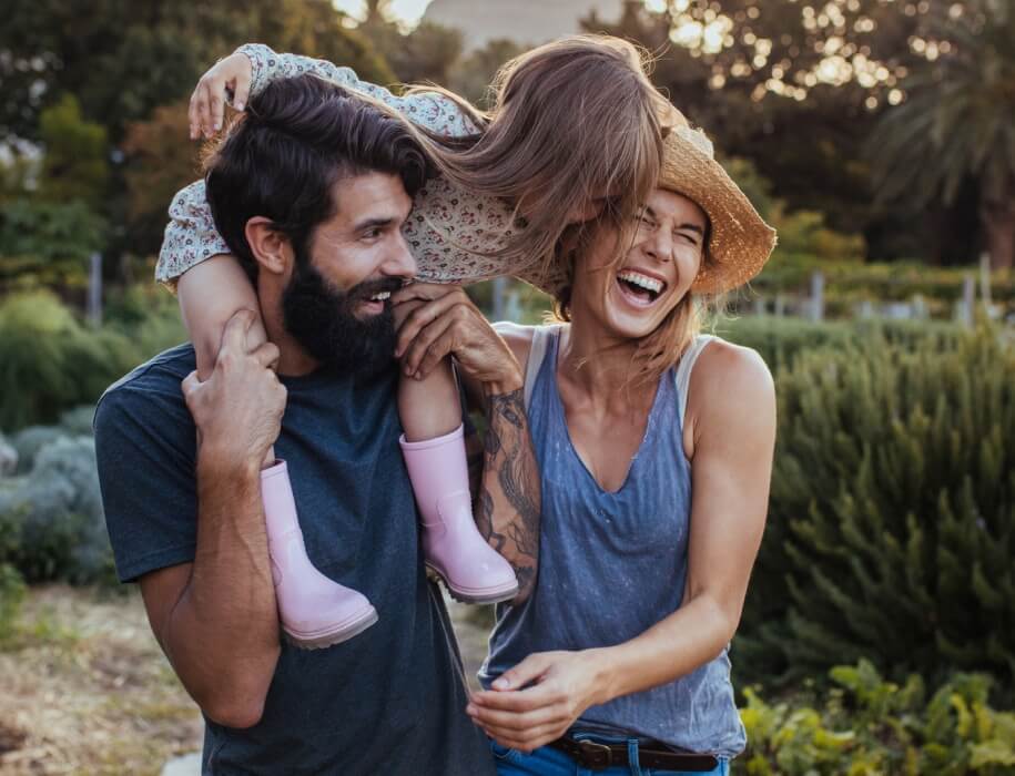 young family walking outside